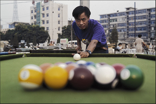 The game of billiards, one of the most common pastimes in the countryside