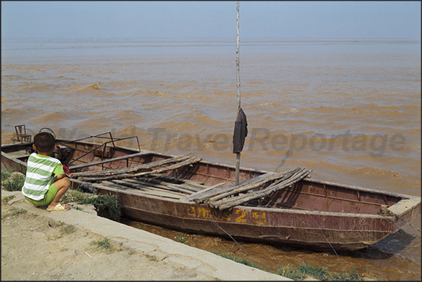 A child observes the Great Yellow River
