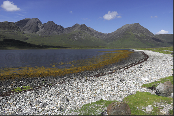 Numerous bays characterize the coast of the south-eastern peninsula of the island