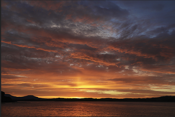 Sunset over Loch Harport Bay where the town of Port Nalong is located