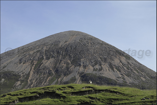 The barren mountains along the coast of the southern peninsula of the island