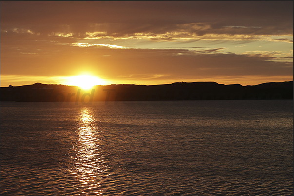 Sunset over Loch Harport Bay where the town of Port Nalong is located