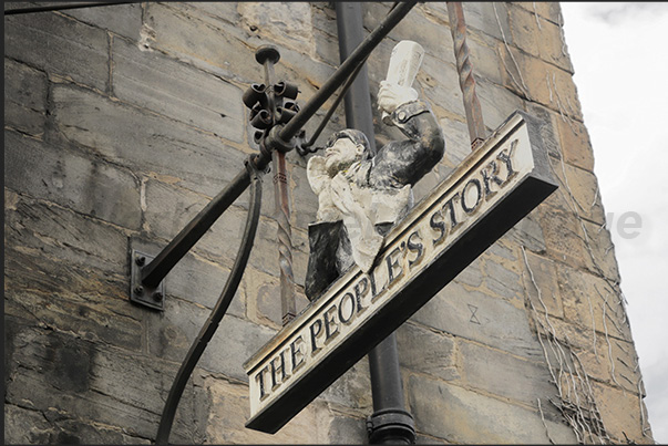 Often, on ancient buildings, one can notice old clocks and signs of businesses that have now disappeared Often, on ancient buildings, one can notice old clocks and signs of businesses that have now disappeared