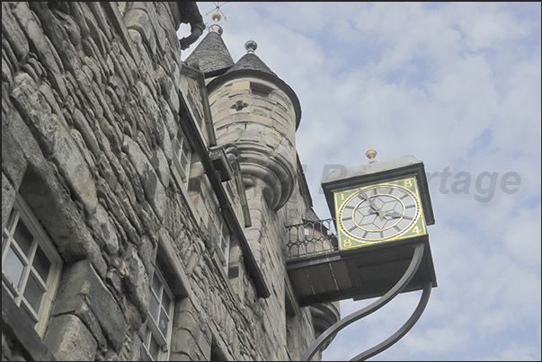 Often, on ancient buildings, one can notice old clocks and signs of businesses that have now disappeared Often, on ancient buildings, one can notice old clocks and signs of businesses that have now disappeared