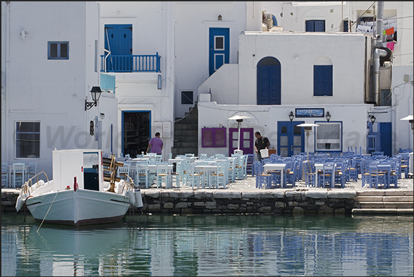 Naoussa. The waterfront of the old fishing port with restaurants on the docks